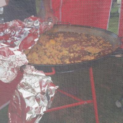 Vendor selling fresh made paella