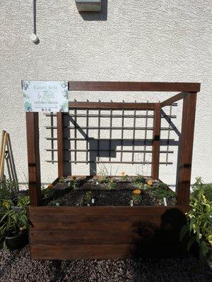 @greeniesgarden local family makes raised garden beds and there's one we got look at in the nursery by the flowers. So cute.