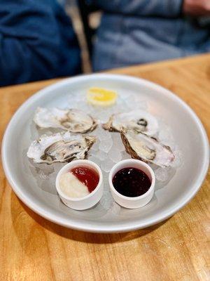 Oysters Shucked raw on the halfshell, pickled horseradish, cocktail sauce, lemon