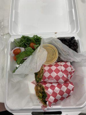 Jack fruit BBQ wrap plate with side salad and rice & beans.