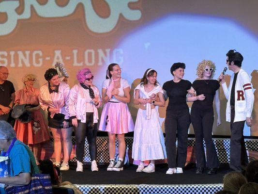 Costume contest for the Grease sing along- this group sat next to me. 100% in it to win it