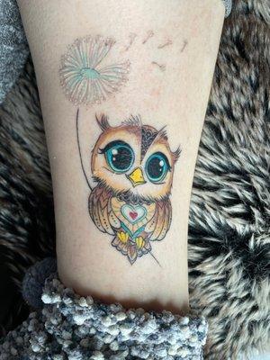 Hoot with dandelion