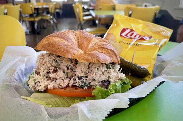 Chicken salad sandwich on a croissant