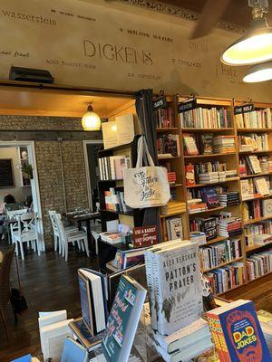 Inside the store with some tables in the background