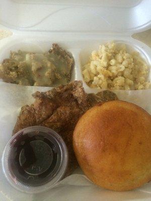 Fried pork chop, cornbread muffin, dressing and mac&cheese