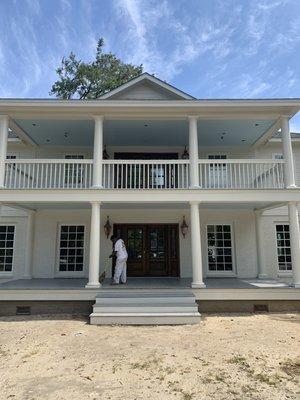 Aunt bettys China on siding and brick. Piazza blue on the ceilings, and mahogany doors were stained with Dark Walnut stain