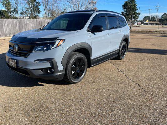 Another satisfied customer shined up and protected for 4 years. Look at how deep the gloss is. Call us today to get your vehicle protected!