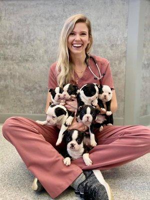 How can you not smile with an armful of puppies?!