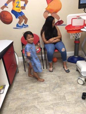 Having fun while waiting for his favorite doctor