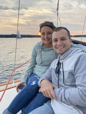 Newlyweds enjoying a sunset sail