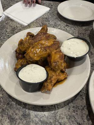 Trashed wings re-tossed in Buffalo sauce with bleu cheese.