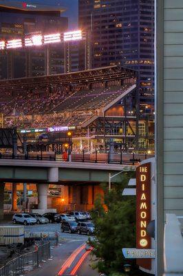 Property Sign and view of Rockies Stadium