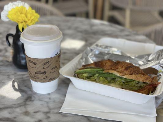 Delicious honey latte and crossiant sandwich