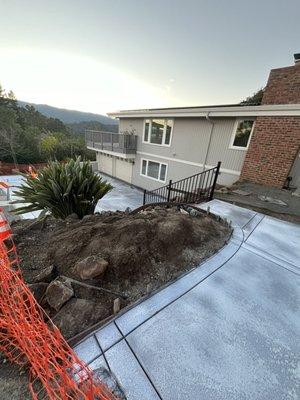 concrete walkway and driveway/motorcourt