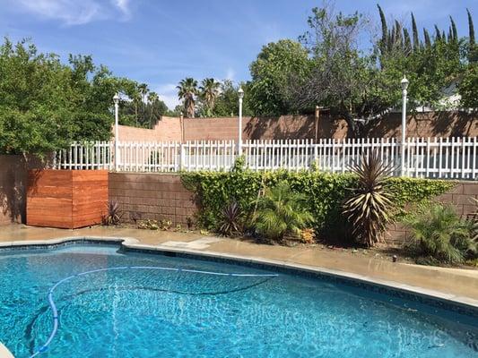 Complete pool remodel including plumbing, coping, glass waterline tile, and mini pebble finish with glass pebble and abalone shell.