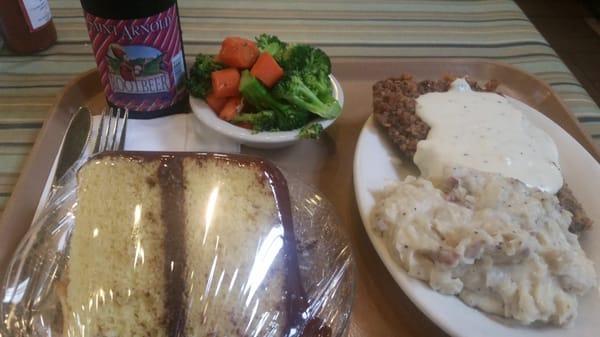 Chicken fried steak, mashed potatoes,  broccoli and carrots,  yellow cake, and root beer