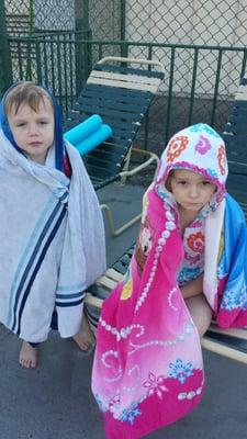 My sad kids, after being told they can't even wear a life jacket, much less a water noodle or a beach ball. LAME!