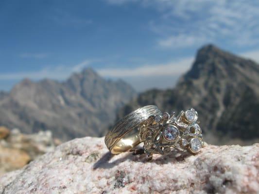 Worked with Jackie to design and create these rings from old family materials. Proposed on a mountain pass while backpacking.