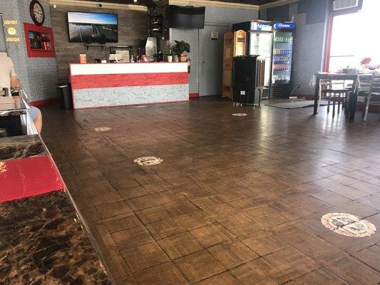 The middle of the restaurant was wide open and the floor was dirty.