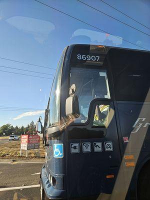 Aggresive greyhound driver using his middle finger to me