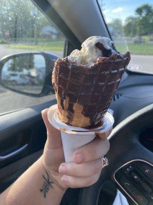 Cookie dough ice cream in a chocolate dipped waffle cone!