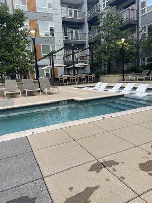 Beautiful pool with lots of seatings, grills and shaded seating . So nice!