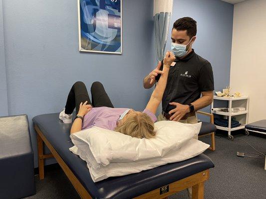 Dr. Laurent helping Mrs. Donna improve her strength and stability after her reverse shoulder replacement! Looking good Donna!!