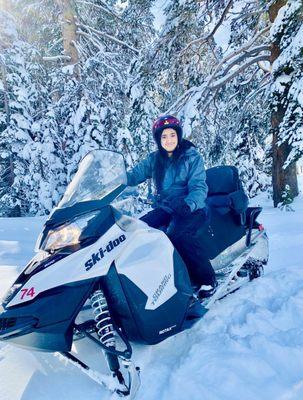 my sons favorite , riding a Snowmobile