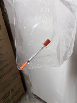 Drug use needle left in our (recovered) stolen boxes.  Items were recovered on site.