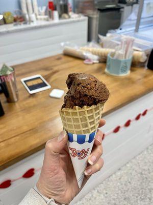 One scoop ice cream waffle cone