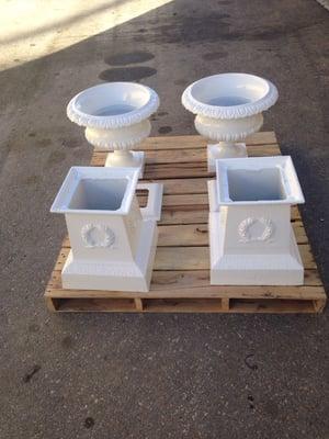 Finished outdoor cast iron planters after sandblasting and coating (white industrial grade epoxy) Our coatings last for years.