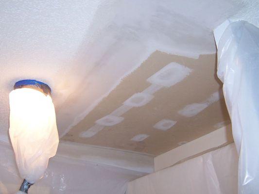 Installed sheetrock on ceiling and applied a three coat taping application