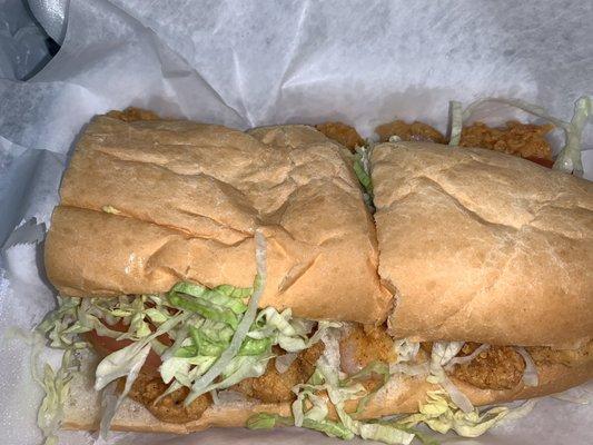 Shrimp PoBoy fully dressed. Well seasoned and great sandwich. Love this place!!!