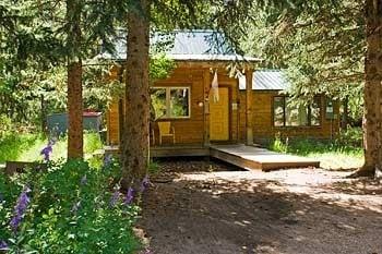 River Hideout has 2 bedrooms, hot tub, wood stove and Internet.