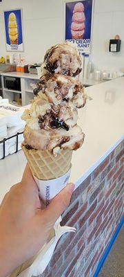 Buckeye (peanut butter ice cream with fudge ripple and buckeye candy pieces) Large Cone