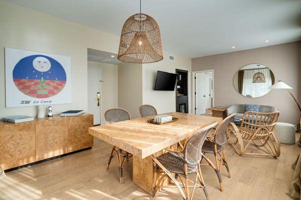 dining and living area on a suite at savoy hotel miami beach