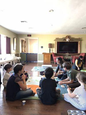 Big kids listening to Sunday's message, led by Florence.