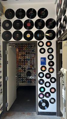 Old school record wall and CD bathroom walls