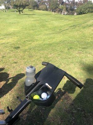 Gold balls in a cart.