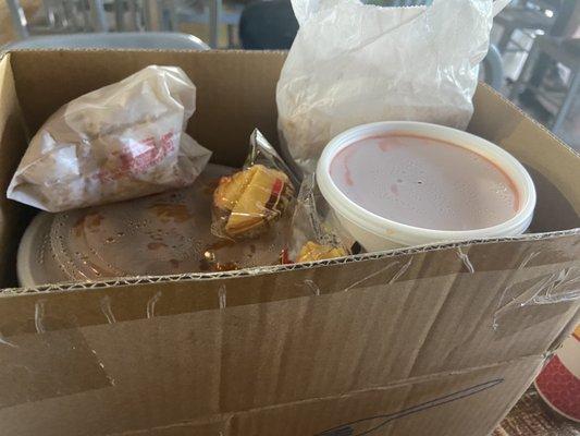 They placed the meal in a box which was nice and easy to carry