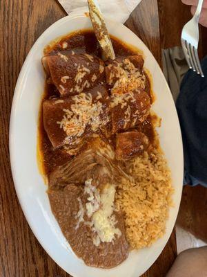 Enchiladas (pork, chicken, shrimp), rice and beans