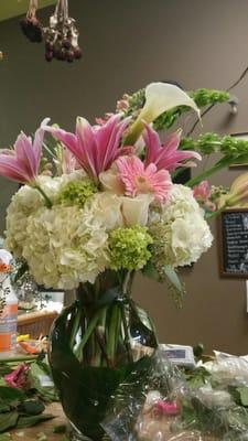 english garden - hydrangeas, roses, star gazer lilies ( I think )