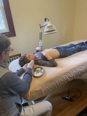 My son receiving an acupuncture treatment.