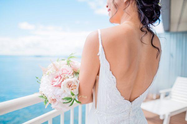 Edgewater Hotel in Seattle. Bride on balcony overlooking elliott bay.