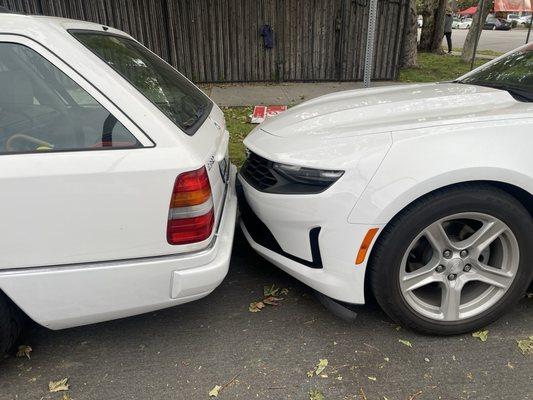 The owner of the shop parking Customer cars like this. Hitting my car.