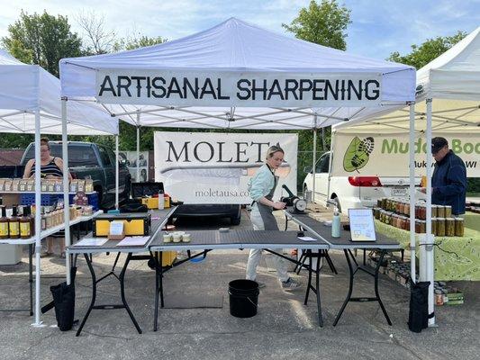 Sharpening while you shop by Moleta at the Waukesha Farmers Market!