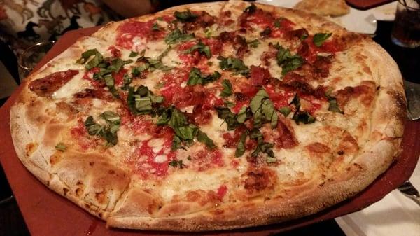 Bacon,  basil,  and gorgonzola cheese pizza.