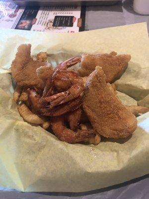 Shrimp and catfish combo. Catfish was ok. Shrimp was chewy and dry. That basket was $14.00.