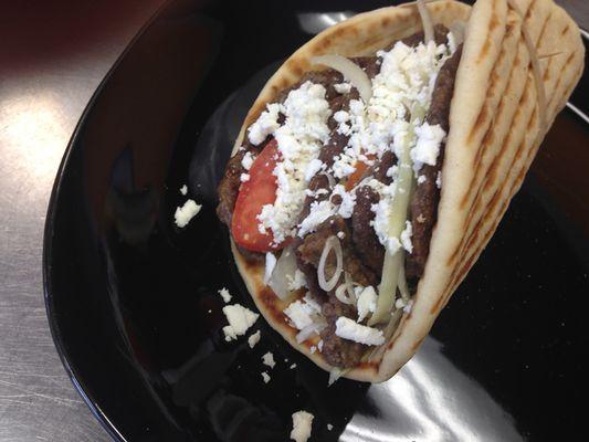 Gyros with Feta,Onion,Tomato,Lettuce and tzatziki.