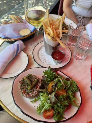 Steak Tartare Au Couteau
 Hand Cut Filet Mignon, Traditional Condiments, Salad
 $26 and Side of Fries $15 (Aug 2024)